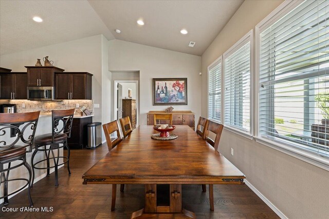 3265 E Galway Cir, Post Falls, ID 83854 - dining space with vaulted ceiling, dark wood-type flooring, and recessed lighting
