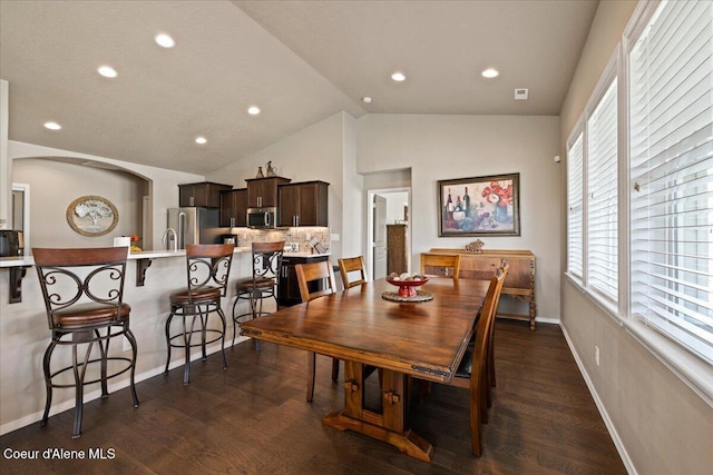 3265 E Galway Cir, Post Falls, ID 83854 - dining room featuring lofted ceiling, dark wood-style floors, and recessed lighting