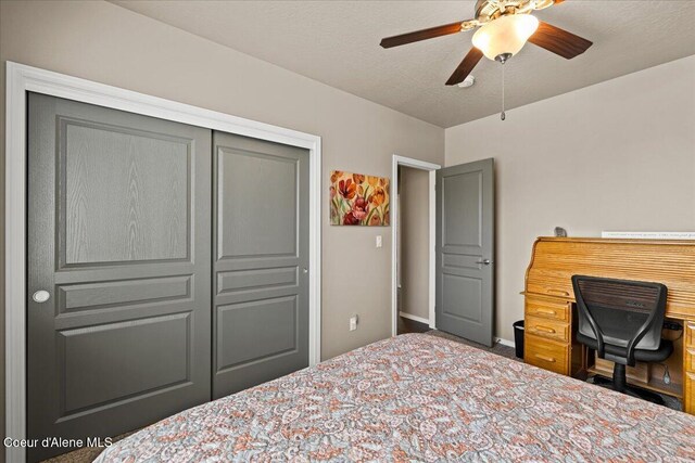 3265 E Galway Cir, Post Falls, ID 83854 - bedroom featuring a closet, carpet floors, and a ceiling fan