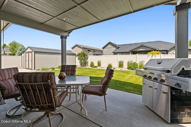 3265 E Galway Cir, Post Falls, ID 83854 - fenced backyard featuring a shed, a patio area, and outdoor dining area
