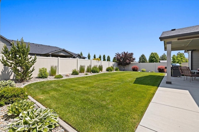 3265 E Galway Cir, Post Falls, ID 83854 - fenced backyard featuring a patio area