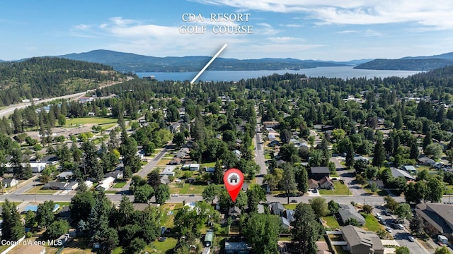 1901 E Pennsylvania Ave, Coeur Dalene, ID 83814 - aerial overview of property's location with a heavily wooded area and a water and mountain view