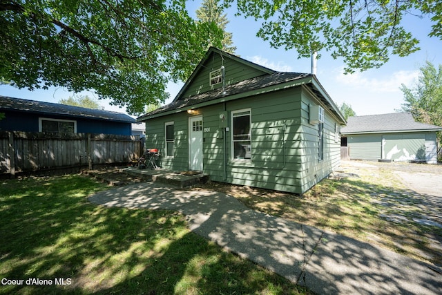 1901 E Pennsylvania Ave, Coeur Dalene, ID 83814 - rear view of property featuring a patio area