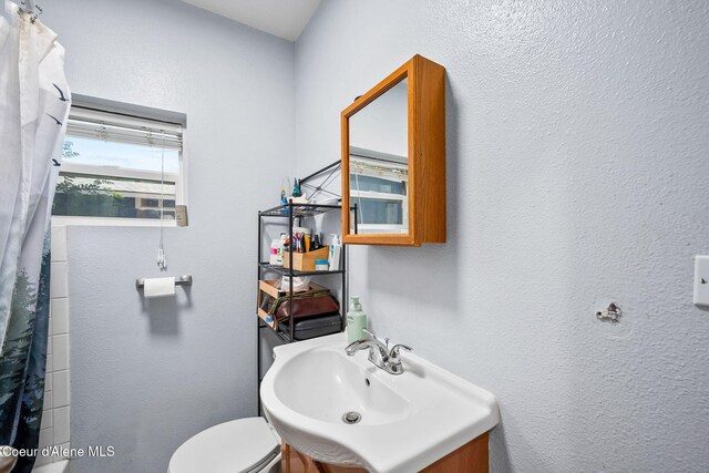 1901 E Pennsylvania Ave, Coeur Dalene, ID 83814 - bathroom with vanity and a shower with curtain