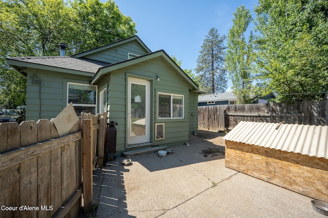 1901 E Pennsylvania Ave, Coeur Dalene, ID 83814 - back of house featuring a patio