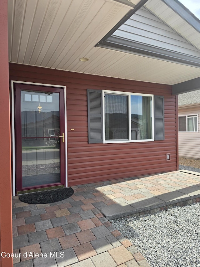 8706 W Sawtooth St, Rathdrum, ID 83858 - entrance to property with a patio