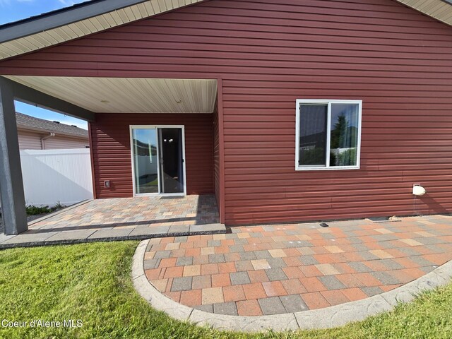 8706 W Sawtooth St, Rathdrum, ID 83858 - back of property with a patio area