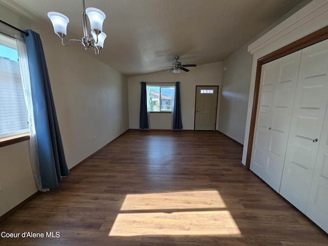 8706 W Sawtooth St, Rathdrum, ID 83858 - entryway with vaulted ceiling, ceiling fan, dark wood-style floors, and a chandelier