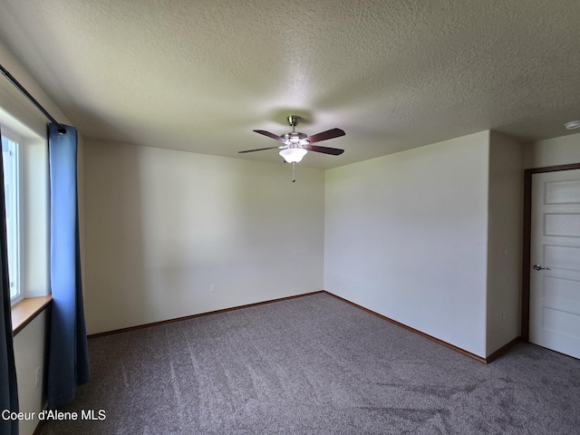 8706 W Sawtooth St, Rathdrum, ID 83858 - carpeted spare room with ceiling fan, a textured ceiling, and a smoke detector