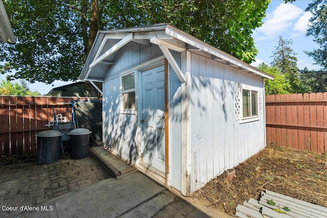1038 N 15th St, Coeur Dalene, ID 83814 - view of shed featuring a fenced backyard