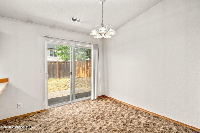 2533 W Grenoble Ln, Coeur Dalene, ID 83815 - empty room featuring a chandelier, carpet, and a textured ceiling