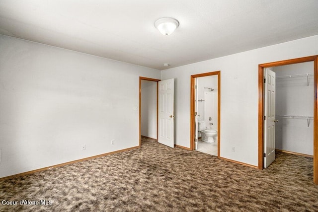 2533 W Grenoble Ln, Coeur Dalene, ID 83815 - unfurnished bedroom featuring carpet floors, a spacious closet, a closet, and connected bathroom