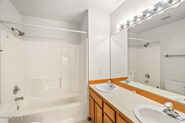 2533 W Grenoble Ln, Coeur Dalene, ID 83815 - full bathroom featuring shower / washtub combination and double vanity