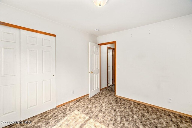 2533 W Grenoble Ln, Coeur Dalene, ID 83815 - unfurnished bedroom with carpet and a closet