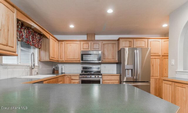 6531 Tannenbaum Cir, Bonners Ferry, ID 83805 - kitchen featuring appliances with stainless steel finishes, light brown cabinets, and recessed lighting