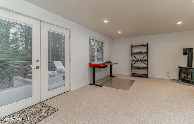 6531 Tannenbaum Cir, Bonners Ferry, ID 83805 - doorway with a wood stove, carpet flooring, and recessed lighting