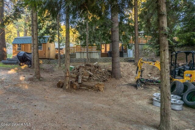 6531 Tannenbaum Cir, Bonners Ferry, ID 83805 - view of yard featuring a storage unit