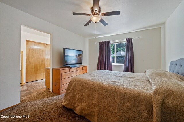 8562 N Audubon Dr, Hayden, ID 83835 - bedroom featuring light colored carpet and ceiling fan