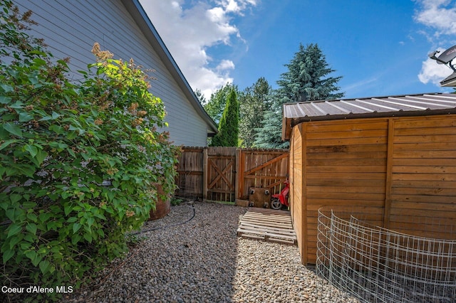 8562 N Audubon Dr, Hayden, ID 83835 - view of yard featuring a gate