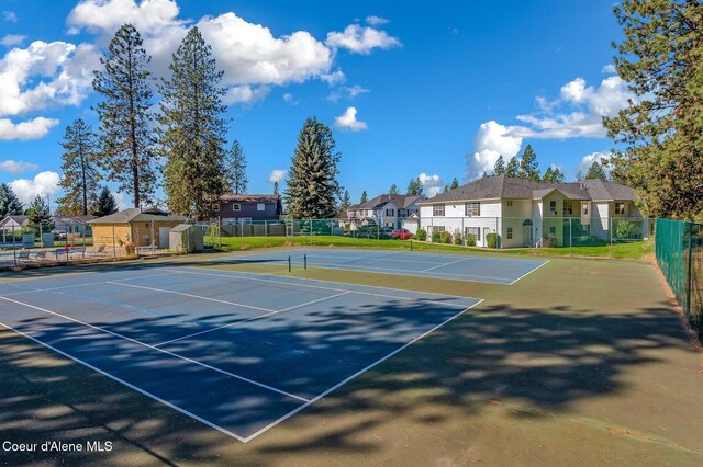8562 N Audubon Dr, Hayden, ID 83835 - view of tennis court with a residential view