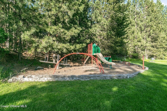 8562 N Audubon Dr, Hayden, ID 83835 - community jungle gym with a lawn
