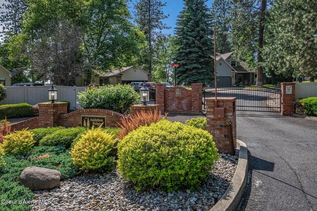 8562 N Audubon Dr, Hayden, ID 83835 - community / neighborhood sign featuring a gate