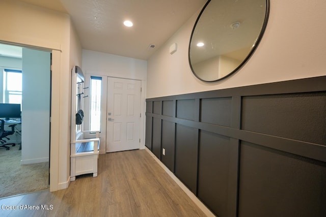 5987 W Quinn Way, Rathdrum, ID 83858 - hallway featuring light wood-style floors, an office area, wainscoting, and recessed lighting