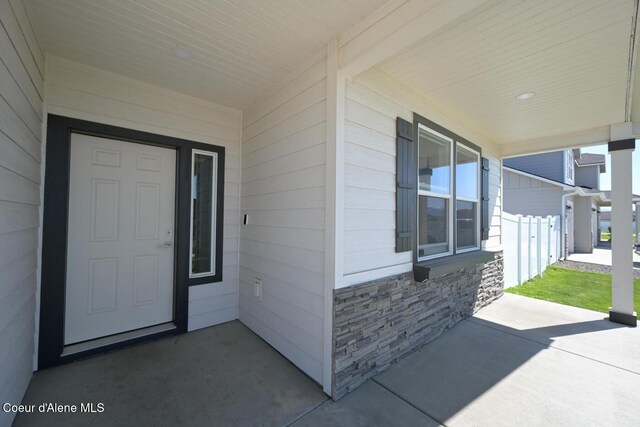 5987 W Quinn Way, Rathdrum, ID 83858 - property entrance featuring stone siding and a porch