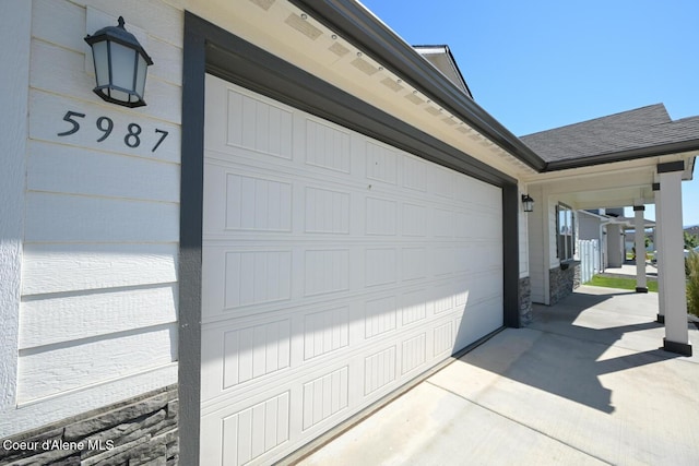 5987 W Quinn Way, Rathdrum, ID 83858 - garage featuring driveway