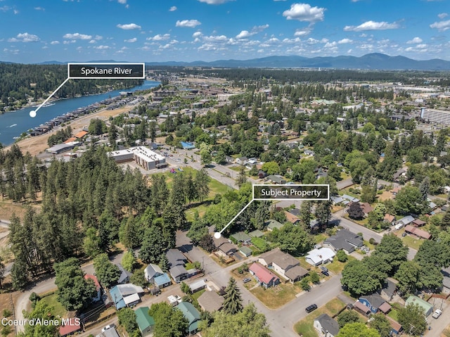 1502 N Melrose St, Coeur Dalene, ID 83814 - aerial view of property's location with a water and mountain view and property parcel outlined