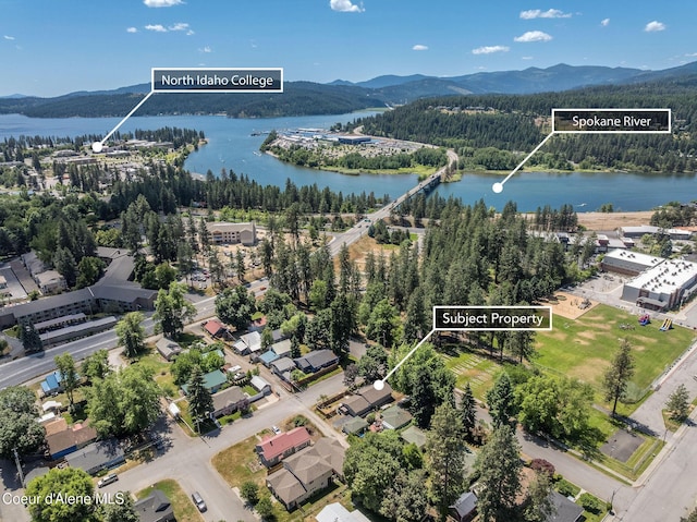 1502 N Melrose St, Coeur Dalene, ID 83814 - aerial view of property's location featuring a water and mountain view and property boundaries highlighted
