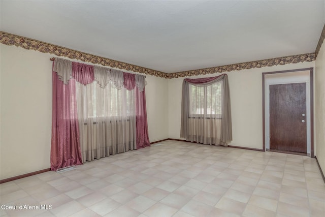 1502 N Melrose St, Coeur Dalene, ID 83814 - unfurnished room with baseboards and light flooring