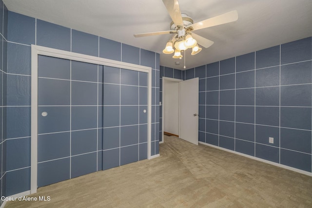 1502 N Melrose St, Coeur Dalene, ID 83814 - carpeted spare room with tile walls and a ceiling fan
