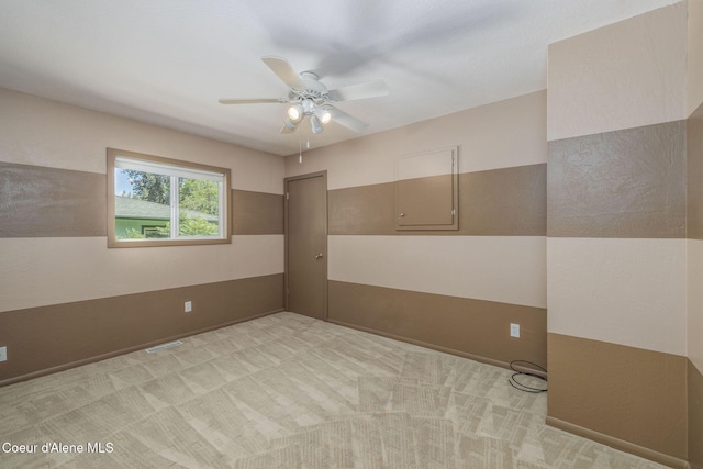1502 N Melrose St, Coeur Dalene, ID 83814 - unfurnished room with a ceiling fan and light carpet