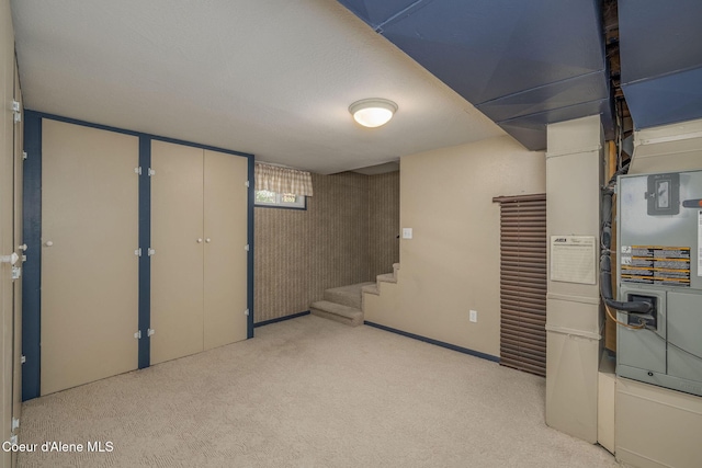 1502 N Melrose St, Coeur Dalene, ID 83814 - below grade area with light colored carpet and stairway
