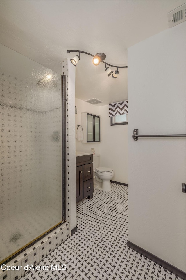 1502 N Melrose St, Coeur Dalene, ID 83814 - bathroom featuring vanity and a stall shower