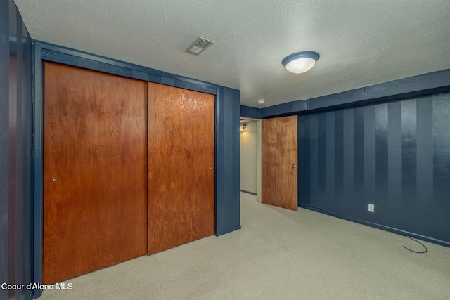 1502 N Melrose St, Coeur Dalene, ID 83814 - unfurnished bedroom with carpet, a closet, and a textured ceiling