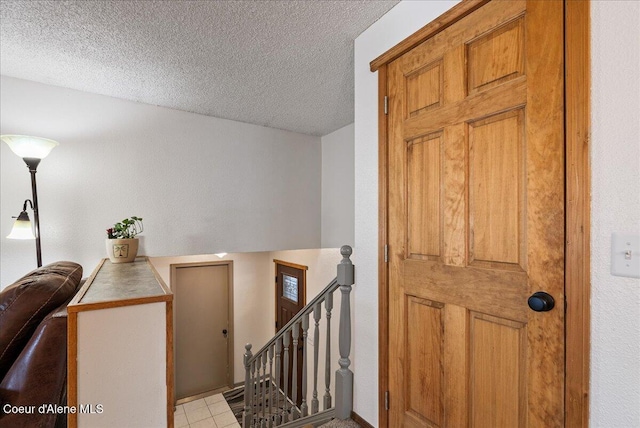 210 S Ross Point Rd, Post Falls, ID 83854 - entryway featuring a textured ceiling