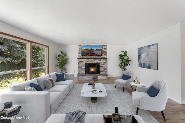 4206 W Appaloosa Rd, Coeur Dalene, ID 83815 - living area featuring wood finished floors and a fireplace