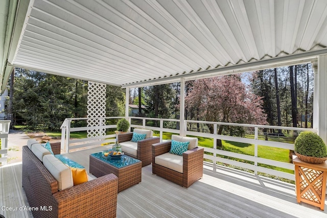 4206 W Appaloosa Rd, Coeur Dalene, ID 83815 - deck featuring an outdoor hangout area, a lawn, and view of scattered trees