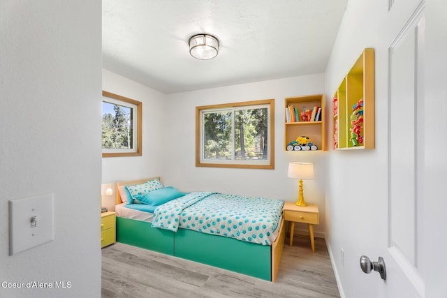 4206 W Appaloosa Rd, Coeur Dalene, ID 83815 - bedroom featuring wood finished floors