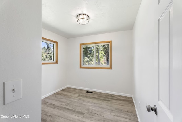 4206 W Appaloosa Rd, Coeur Dalene, ID 83815 - empty room featuring wood finished floors and baseboards