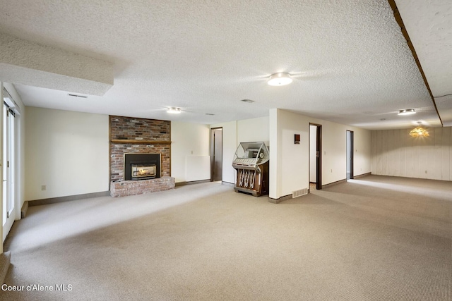 4206 W Appaloosa Rd, Coeur Dalene, ID 83815 - unfurnished living room featuring carpet, a brick fireplace, and a textured ceiling