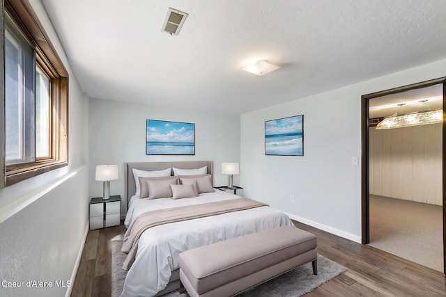 4206 W Appaloosa Rd, Coeur Dalene, ID 83815 - bedroom with wood finished floors