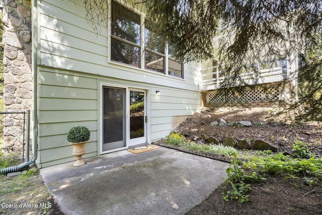 4206 W Appaloosa Rd, Coeur Dalene, ID 83815 - doorway to property featuring a patio area