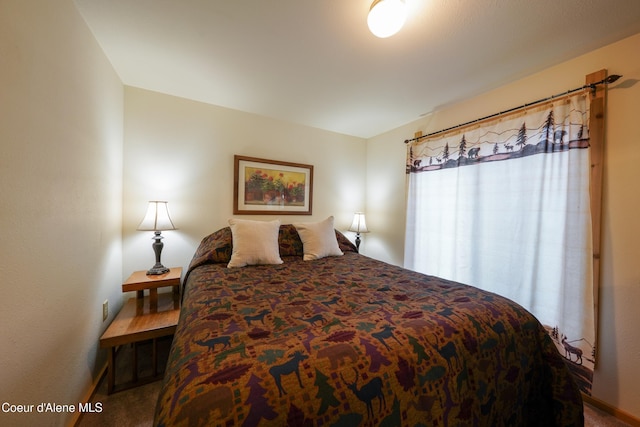 306 Scranton Ave, Coolin, ID 83821 - carpeted bedroom featuring baseboards