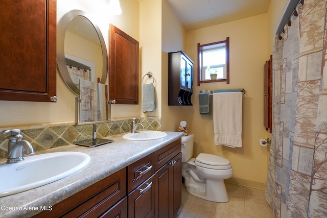 306 Scranton Ave, Coolin, ID 83821 - full bath with double vanity, tile patterned flooring, and decorative backsplash