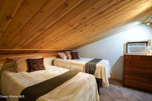 306 Scranton Ave, Coolin, ID 83821 - carpeted bedroom featuring lofted ceiling, an AC wall unit, and wooden ceiling