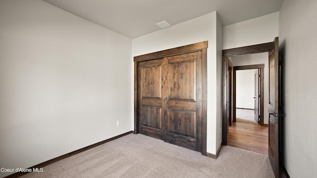 3306 Goodman Dr, Sandpoint, ID 83864 - unfurnished bedroom featuring carpet flooring and baseboards