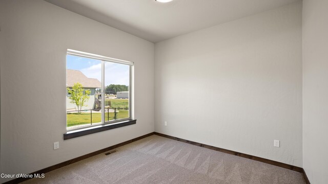 3306 Goodman Dr, Sandpoint, ID 83864 - carpeted empty room featuring baseboards
